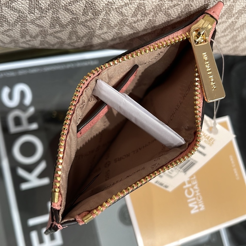 MICHAEL KORS
Jet Set Travel Medium Top Zip Leather Card Case Wallet
Primrose
NWT - Picture 8 of 16